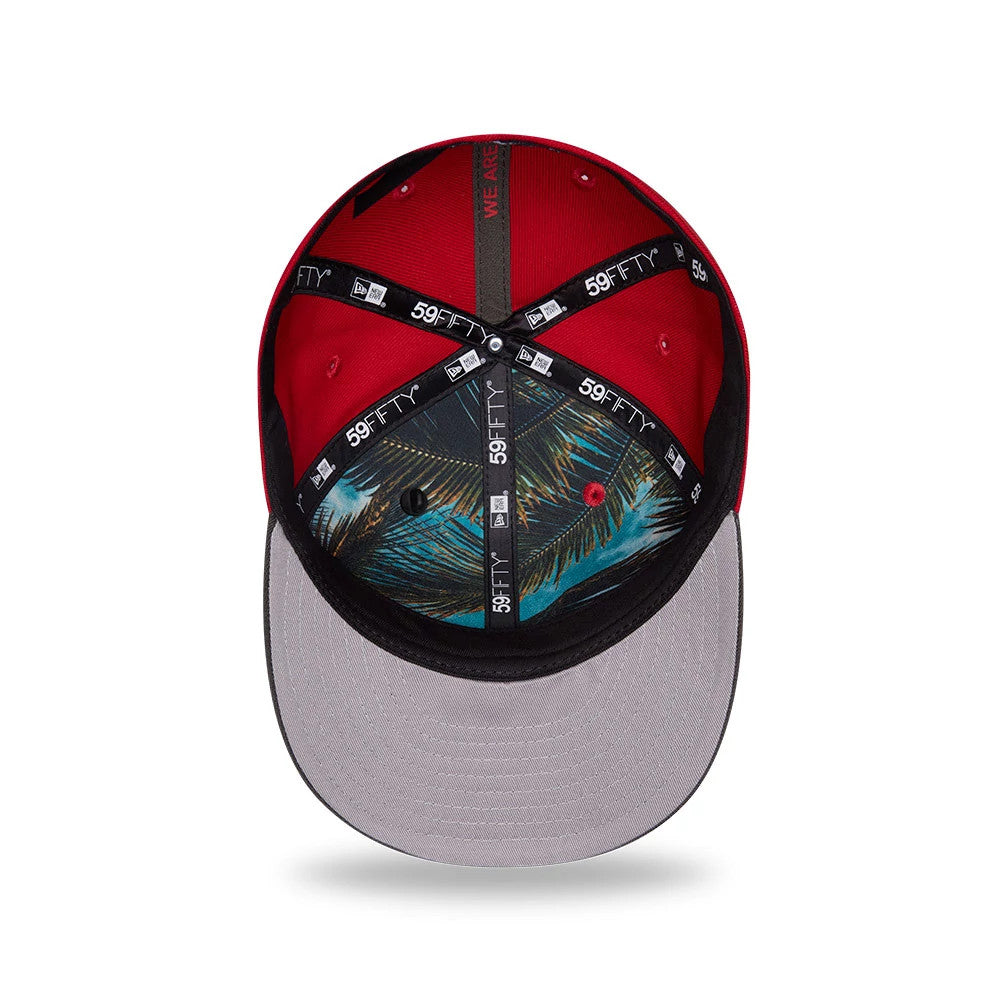 Tampa Bay Buccaneers NFL Draft 2026 Red New Era 59FIFTY Fitted Cap, inside view showing the patterned undervisor with a palm leaf design, black and white 59FIFTY taping, red and black interior panels, and a grey sweatband.