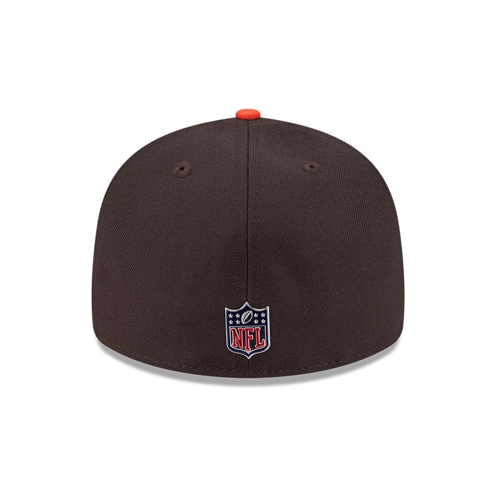 Cleveland Browns NFL Draft 2026 Dark Brown New Era 59FIFTY Fitted Cap, rear view showing the embroidered NFL shield logo centred on the back panels, with a structured dark brown crown and a contrasting orange top button.