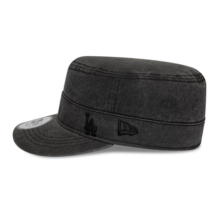 New Era LA Dodgers MLB Military Quickstrike Black Military Cap, side view showing a black embroidered LA logo and the New Era flag logo on the structured black crown, with a flat visor and a size sticker on the visor.
