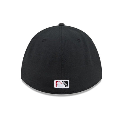 Pictured is this MiLB On Field Player Replica Lake Elsinore Storm 39THIRTY M-Crown Stretch Fit cap in Black. 7