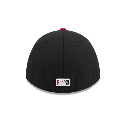 Pictured is this MiLB On Field Player Replica Lake Elsinore Storm 39THIRTY M-Crown Stretch Fit cap in Black. 7