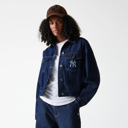 The model is wearing this Womens MLB Denim New York Yankees Jacket in dark blue. 1