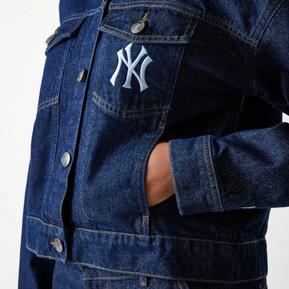 The model is wearing this Womens MLB Denim New York Yankees Jacket in dark blue. 3