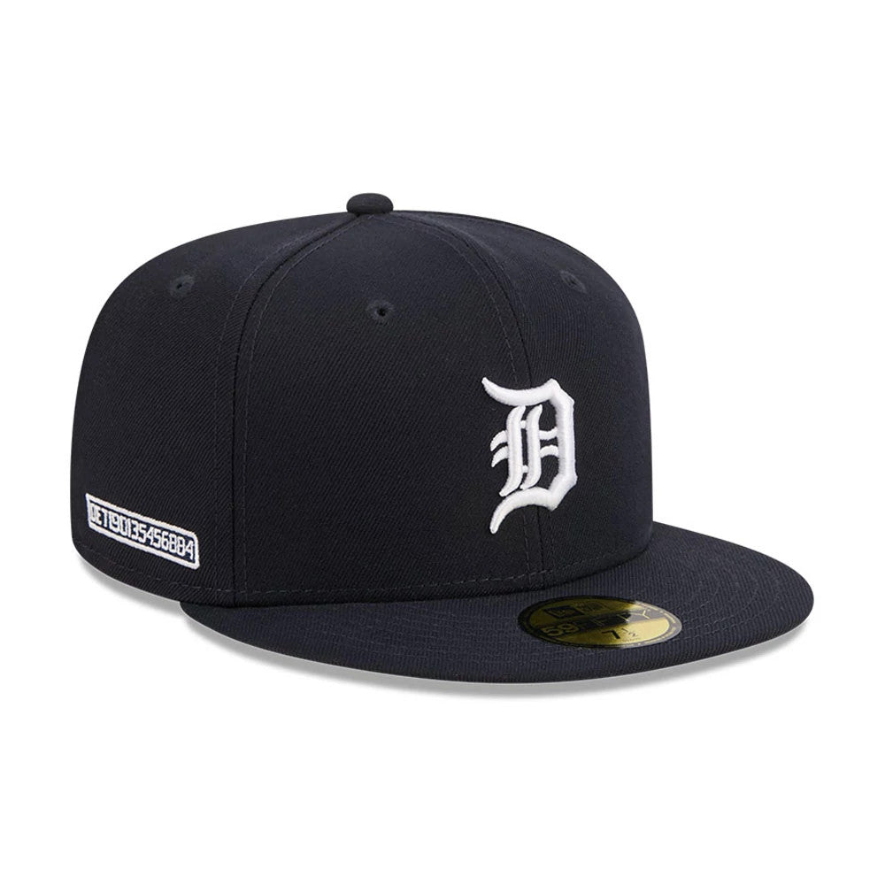 Detroit Tigers MLB City Connect Black New Era 59FIFTY Fitted Cap, three-quarter view showing the raised white embroidered team logo on the front panel, a flat black visor with a gold 59FIFTY size sticker, and a patch on the side.