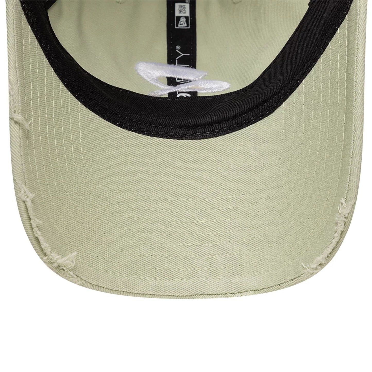 Pictured is this Quadrant X New Era Distressed 9TWENTY cap in pastel green. 7