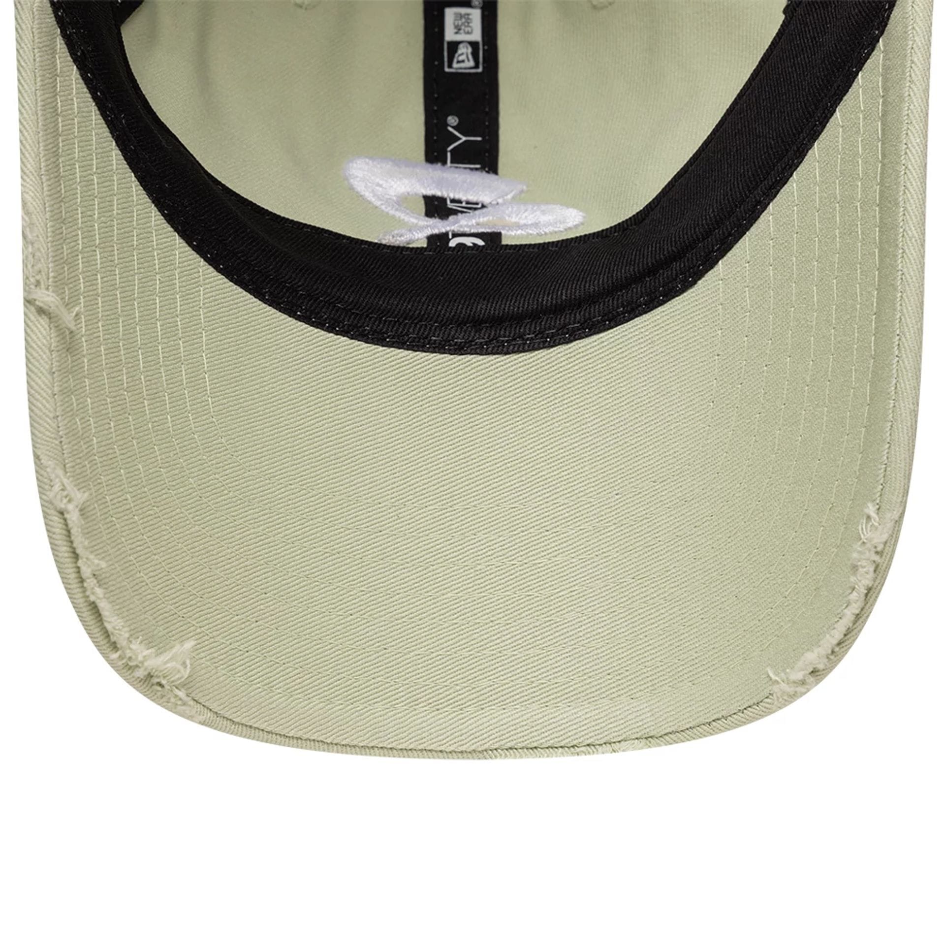 Pictured is this Quadrant X New Era Distressed 9TWENTY cap in pastel green. 7
