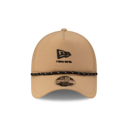 Pictured is this New Era 9FORTY Apex cap in beige. 3