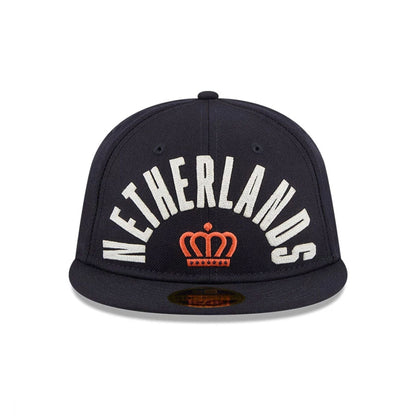 Pictured is this WBC Classical Script Netherlands Retro Crown 59FIFTY Fitted cap in Navy. 3