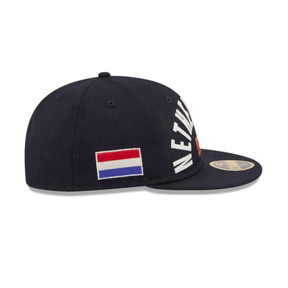 Pictured is this WBC Classical Script Netherlands Retro Crown 59FIFTY Fitted cap in Navy. 5