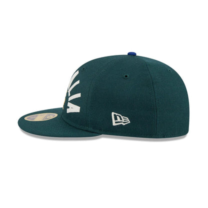 Pictured is this WBC Classical Script Australia Retro Crown 59FIFTY Fitted cap in dark green. 6