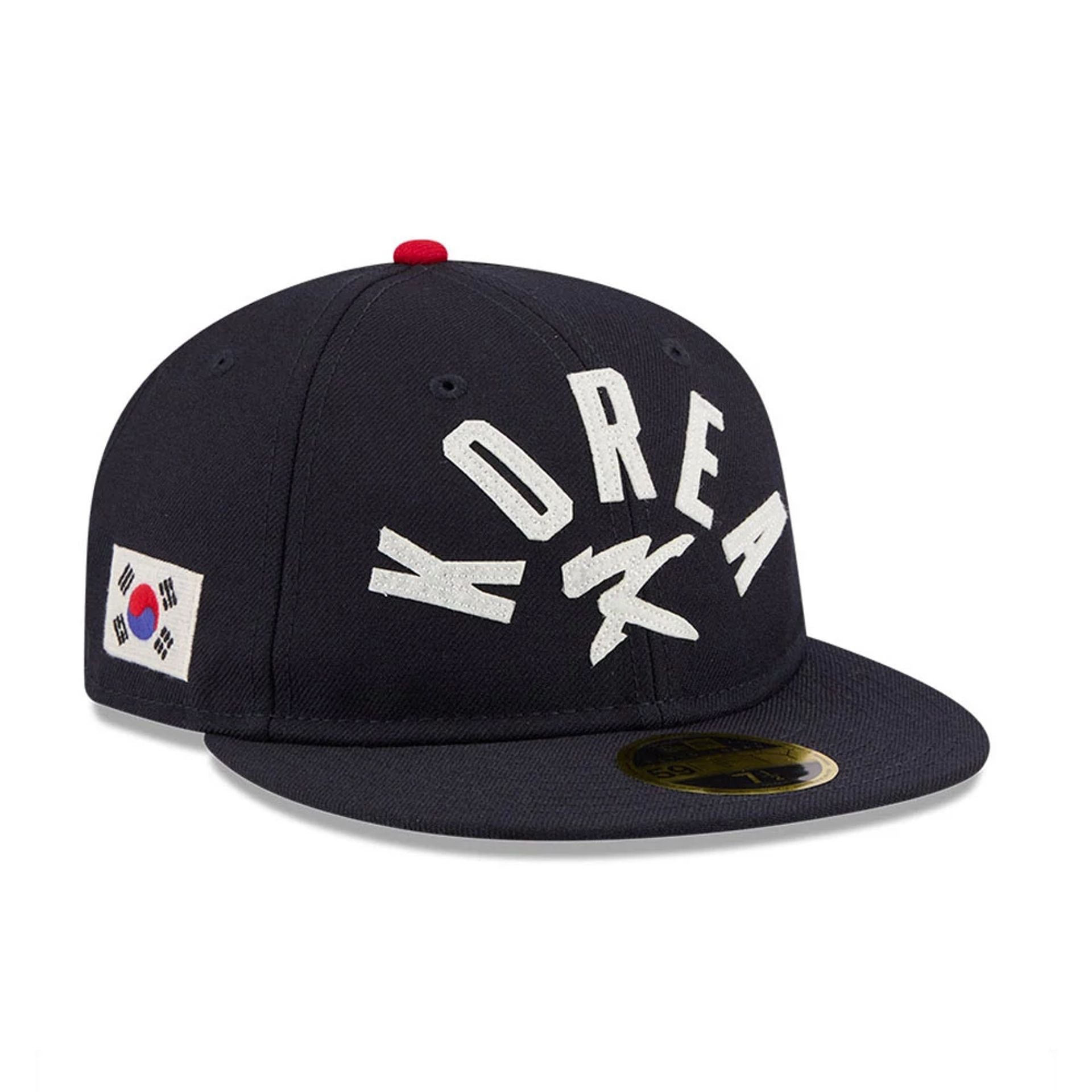 Pictured is this WBC Classical Script Korea Retro Crown 59FIFTY Fitted cap in blue. 1