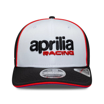 Pictured is this Aprilia Team 9SEVENTY Stretch Snap cap in white. 4