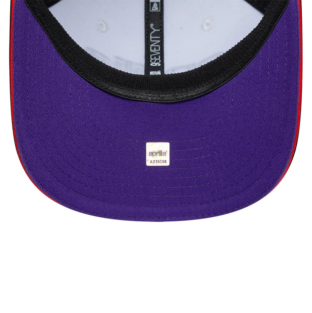 Pictured is this Aprilia Team 9SEVENTY Stretch Snap cap in white. 2