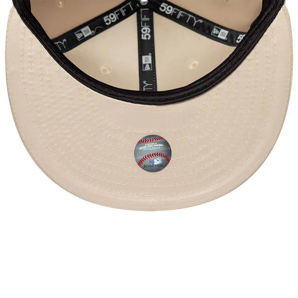 Pictured is this MLB Satin LA Dodgers 59FIFTY Fitted cap in cream. 5