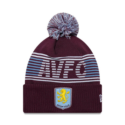 Pictured is this Aston Villa FC Bobble Knit Beanie hat in dark red. 1