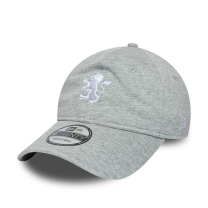 Aston Villa FC Jersey Grey New Era 9TWENTY Adjustable Cap, three-quarter view showing a white embroidered lion logo on the front panel, a curved visor with a 9TWENTY size sticker, and the New Era flag logo on the left side.