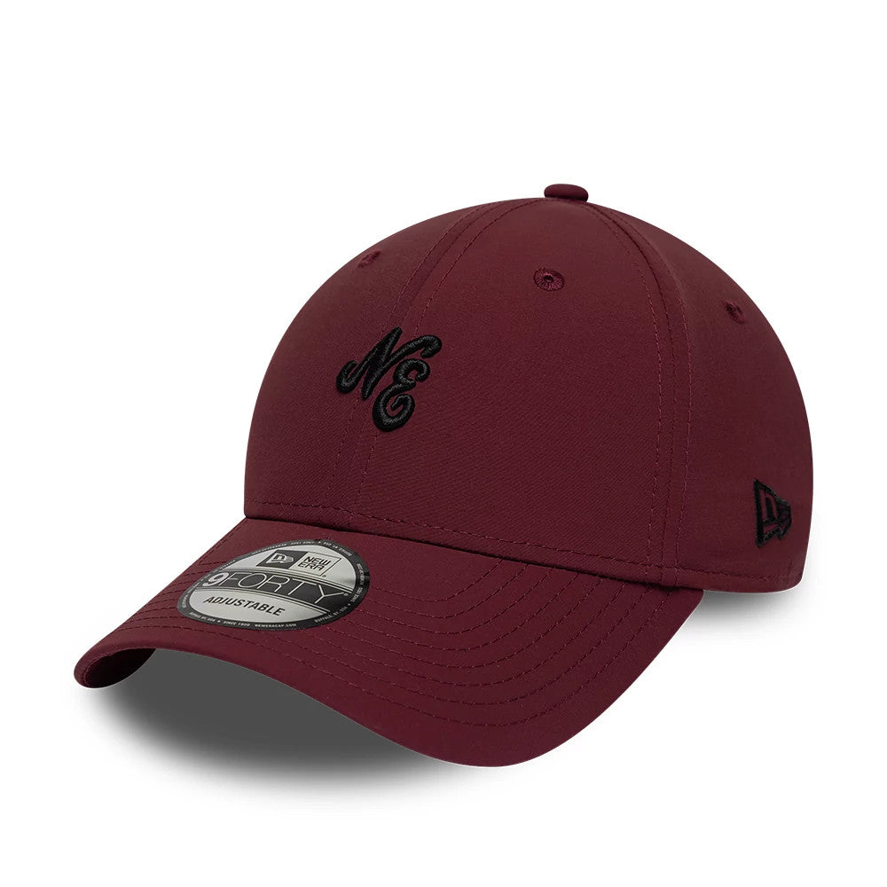 Pictured is this New Era Mini Logo Recycled 9FORTY cap in dark red. 1