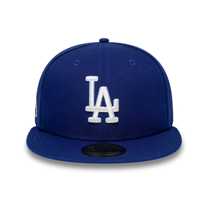 Pictured is this MLB Sidepatch LA Dodgers 59FIFTY Fitted cap in dark blue. 3
