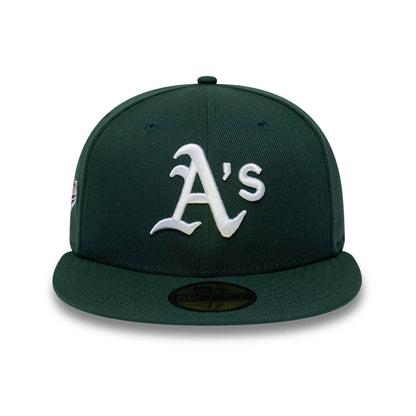 Pictured is this MLB Sidepatch Athletics 59FIFTY Fitted cap in dark green. 3