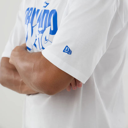 The model is wearing this NBA London Game 2026 Orlando Magic Oversized T-Shirt in white. 5