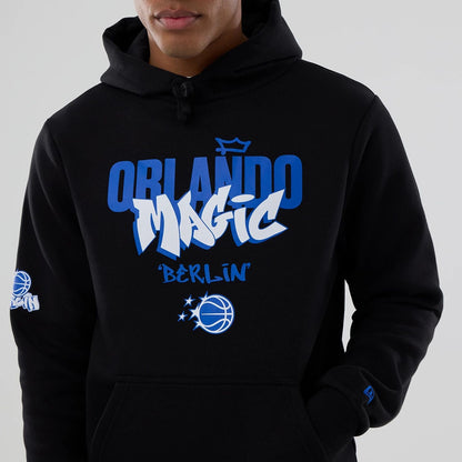 The model is wearing this NBA Berlin Game 2026 Orlando Magic Pullover Hoodie in black. 5