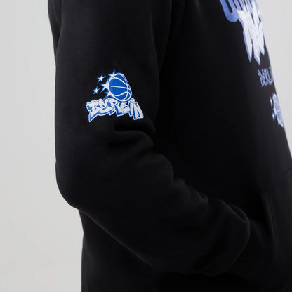 The model is wearing this NBA Berlin Game 2026 Orlando Magic Pullover Hoodie in black. 3