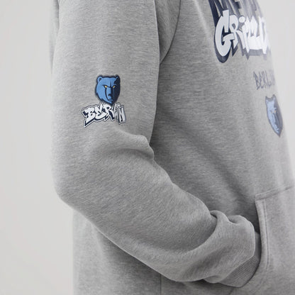 The model is wearing this NBA Berlin Game 2026 Memphis Grizzlies Pullover Hoodie in grey. 3