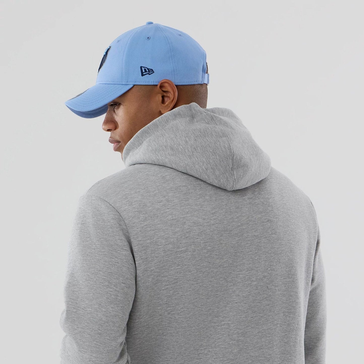 The model is wearing this NBA Berlin Game 2026 Memphis Grizzlies Pullover Hoodie in grey. 7