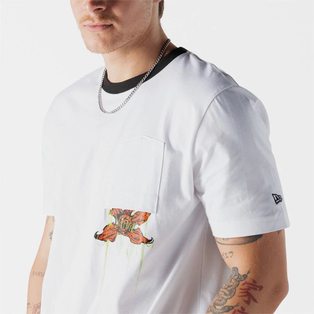 The model is wearing this Netflix Stranger Things Demogorgon T-Shirt in white. 3