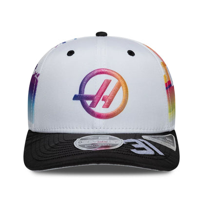 Pictured is this Esteban Ocon Miami Race Special TGR Haas F1 9SEVENTY Stretch Snap cap in white. 3