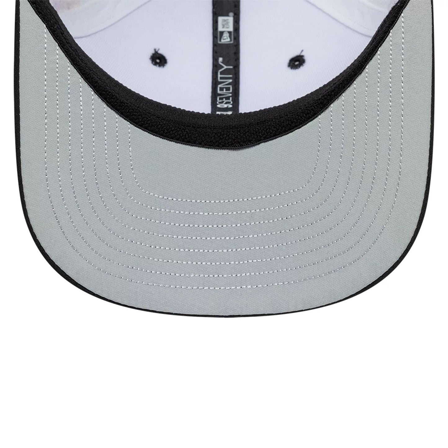 Pictured is this Esteban Ocon Miami Race Special TGR Haas F1 9SEVENTY Stretch Snap cap in white. 2