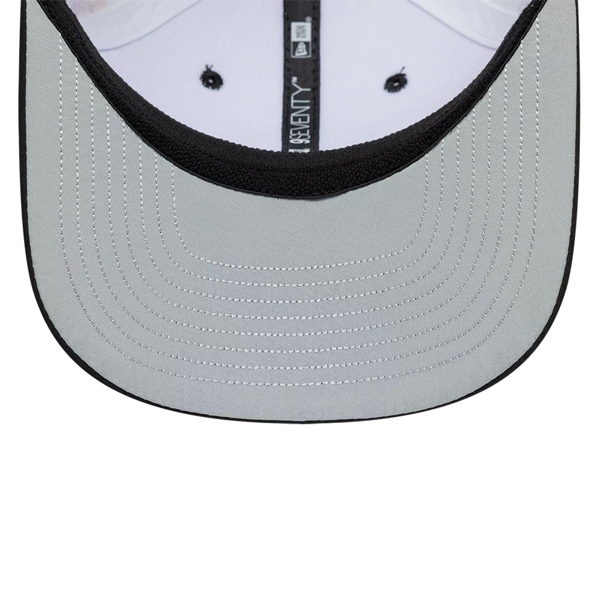 Pictured is this Esteban Ocon Miami Race Special TGR Haas F1 9SEVENTY Stretch Snap cap in white. 2