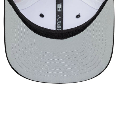 Pictured is this Esteban Ocon Miami Race Special TGR Haas F1 9SEVENTY Stretch Snap cap in white. 2