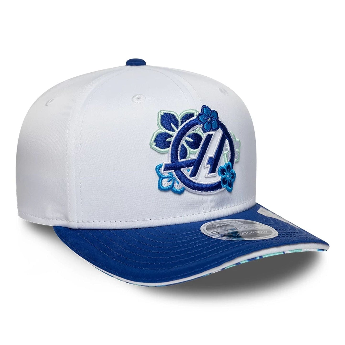 Pictured is this Japan Race Special TGR Haas F1 9SEVENTY Stretch Snap cap in white. 5