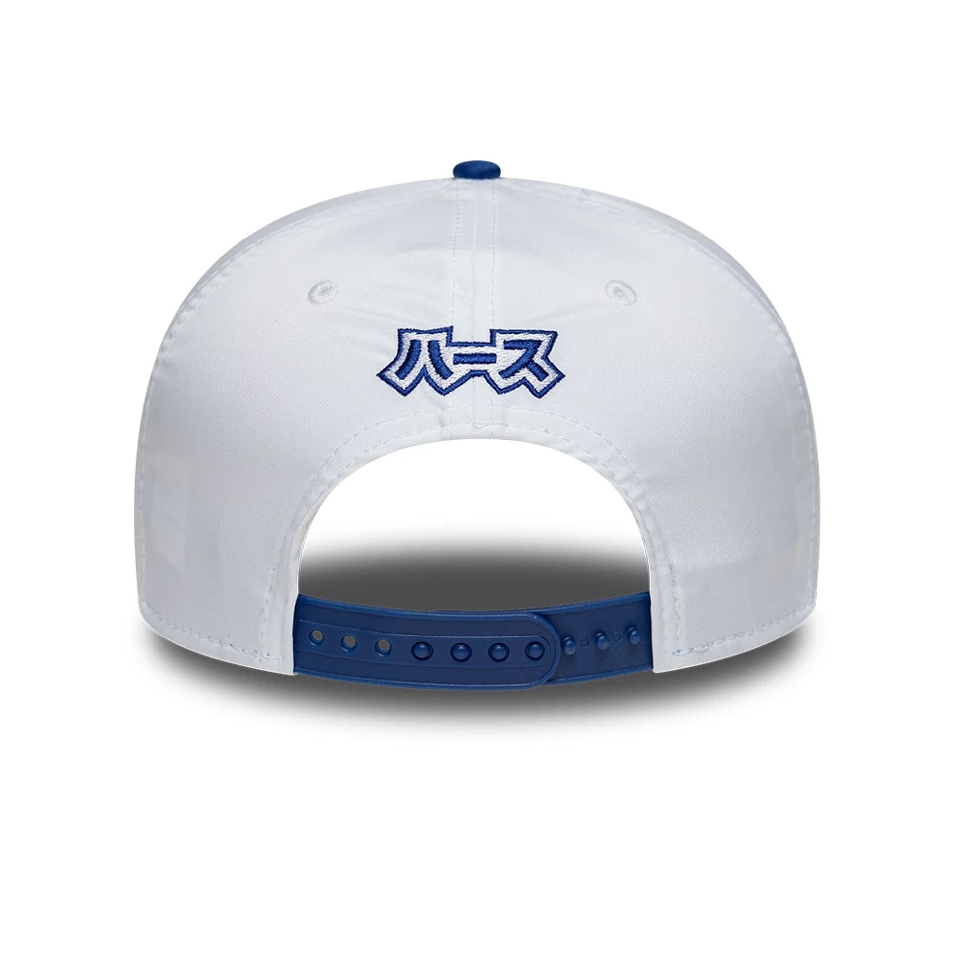 Pictured is this Esteban Ocon Japan Race Special TGR Haas F1 9SEVENTY Stretch Snap cap in white. 3