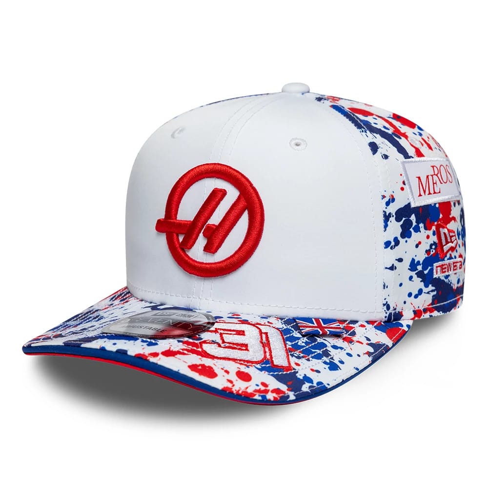 Pictured is this Esteban Ocon Silverstone Race Special TGR Haas F1 9SEVENTY Stretch Snap cap in white. 1