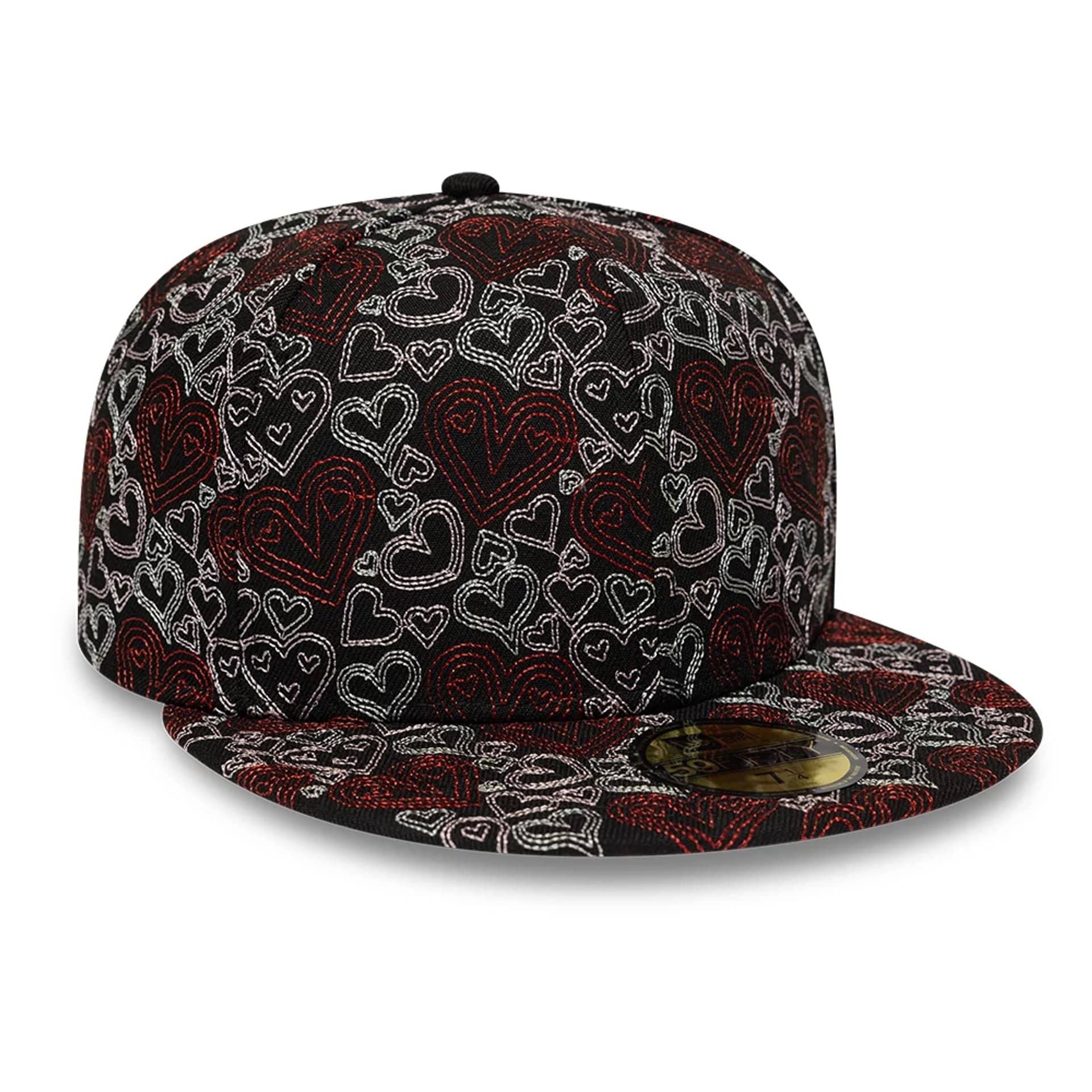 Pictured is this New Era All Over Hearts 59FIFTY Fitted cap in black. 4