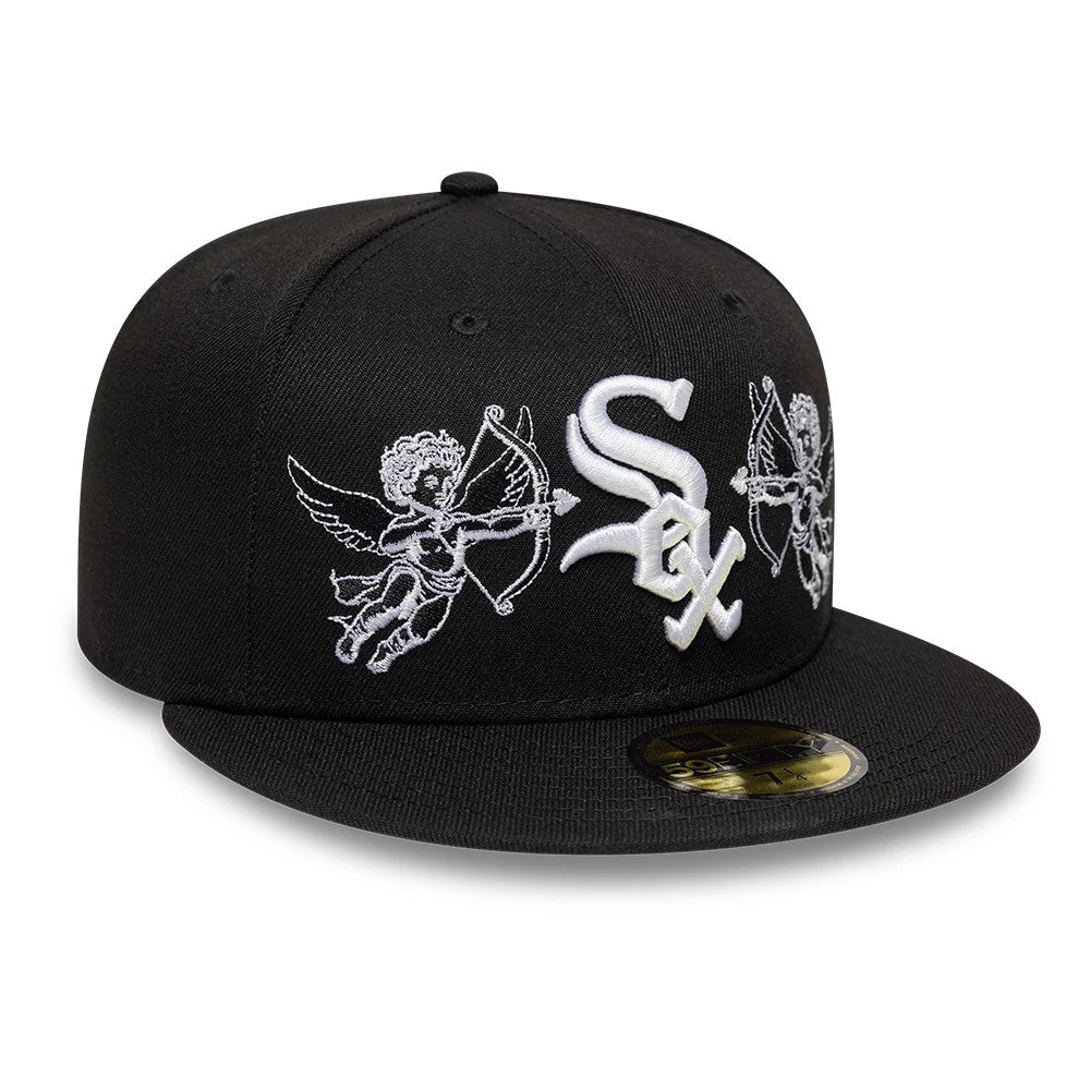 Chicago White Sox MLB Cherub Black New Era 59FIFTY Fitted Cap, front view showing the raised white embroidered Sox logo centred on the black structured crown, flanked by white cherub graphics, with a gold 59FIFTY size sticker on the black flat visor.