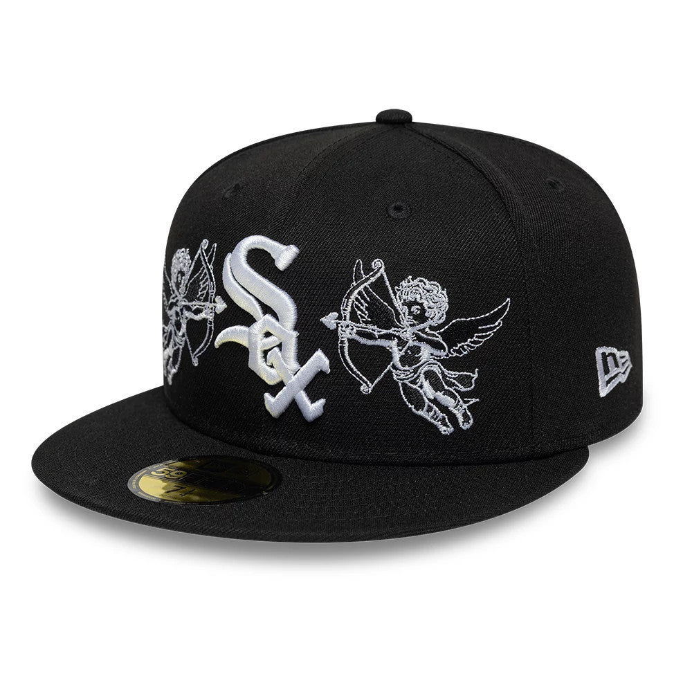 Chicago White Sox MLB Cherub Black New Era 59FIFTY Fitted Cap, three-quarter view showing white embroidered cherubs and large Sox logo on the front panel, complemented by a New Era flag logo on the left side.