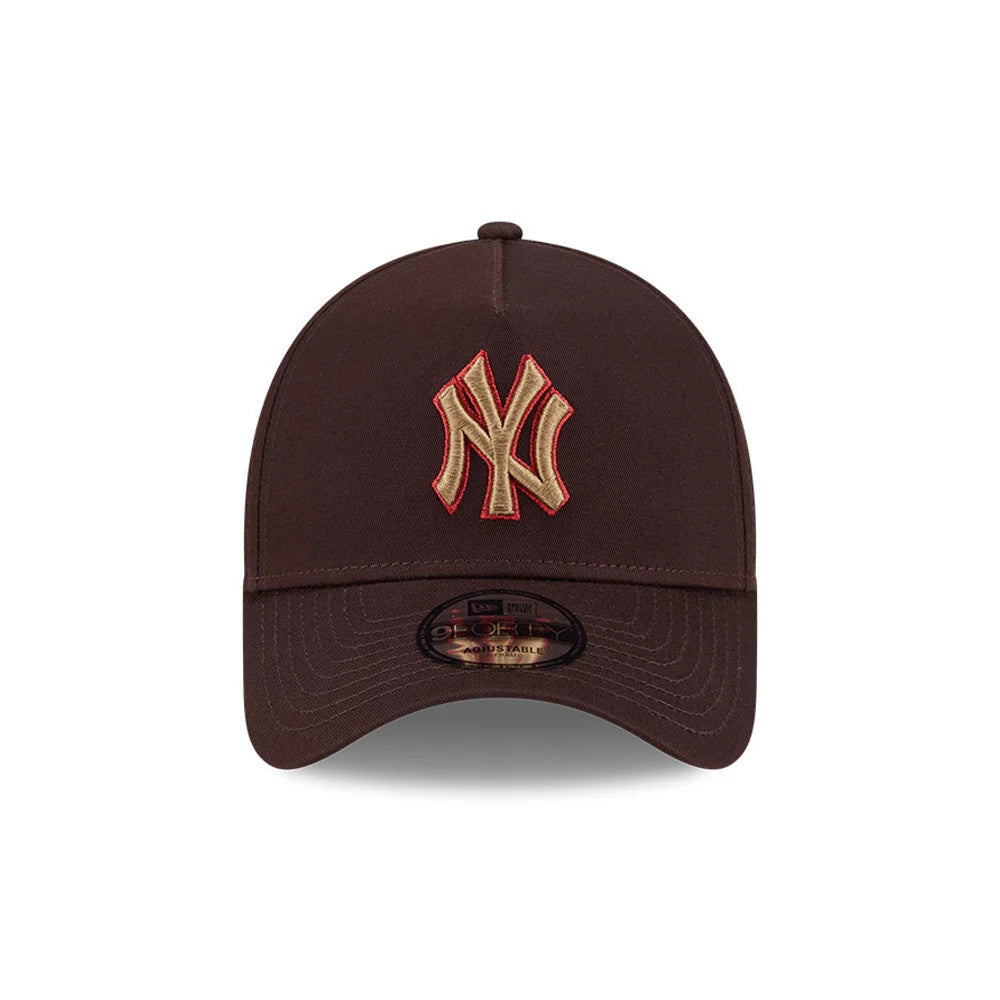 New York Yankees MLB Choc Cherry Dark Brown New Era 9FORTY A-Frame Adjustable Cap, front view showing a raised gold and red embroidered NY logo on the structured dark brown crown, with a 9FORTY size sticker on the slightly curved visor.