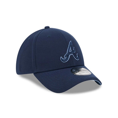 Atlanta Braves MLB Faded Oceanside Dark Blue New Era 39THIRTY Stretch Fit Cap, front view showing the light blue raised embroidered A logo on the dark blue structured crown, with a curved visor and a 39THIRTY size sticker on top.