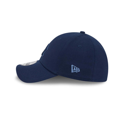Yankees MLB Faded Oceanside Dark Blue New Era 39THIRTY Stretch Fit Cap, side view showing the light blue embroidered New Era flag logo on the left side, a curved visor with a 39THIRTY size sticker, and a structured dark blue crown.