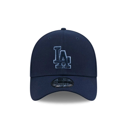 LA Dodgers MLB Faded Oceanside Dark Blue New Era 39THIRTY Stretch Fit Cap, front view showing the raised light blue embroidered LA logo on the dark blue crown, with a 39THIRTY size sticker centred on the matching dark blue visor.