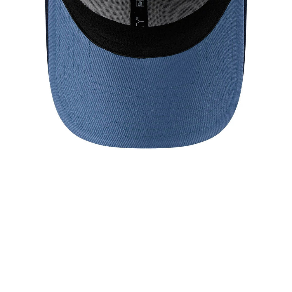 LA Dodgers MLB Faded Oceanside Dark Blue New Era 39THIRTY Stretch Fit Cap, inside view showing the black sweatband, grey taping, and dark blue curved visor from above, highlighting the structured interior design of the cap.