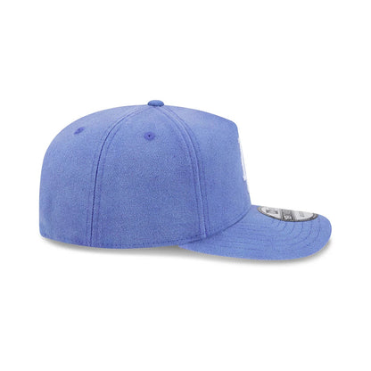 LA Dodgers MLB Duck Canvas Pastel Blue New Era 19TWENTY Adjustable Cap, side view showing the white embroidered Dodgers logo on the front panel, blue visor with a 19TWENTY size sticker, and matching blue top button and eyelets.