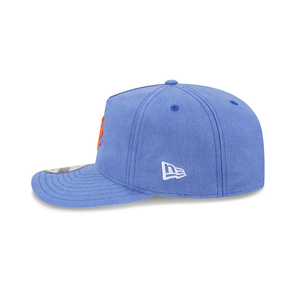 New York Mets MLB Duck Canvas Pastel Blue New Era 19TWENTY Adjustable Cap, side view with the white New Era flag logo on the left side of the blue crown, showing the blue visor with grey striped undervisor and orange front logo.