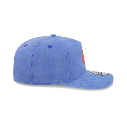 New York Mets MLB Duck Canvas Pastel Blue New Era 19TWENTY Adjustable Cap, side view showing the embroidered orange Mets logo on the front panel, structured pastel blue crown with matching top button, and curved visor with the 19TWENTY size sticker.