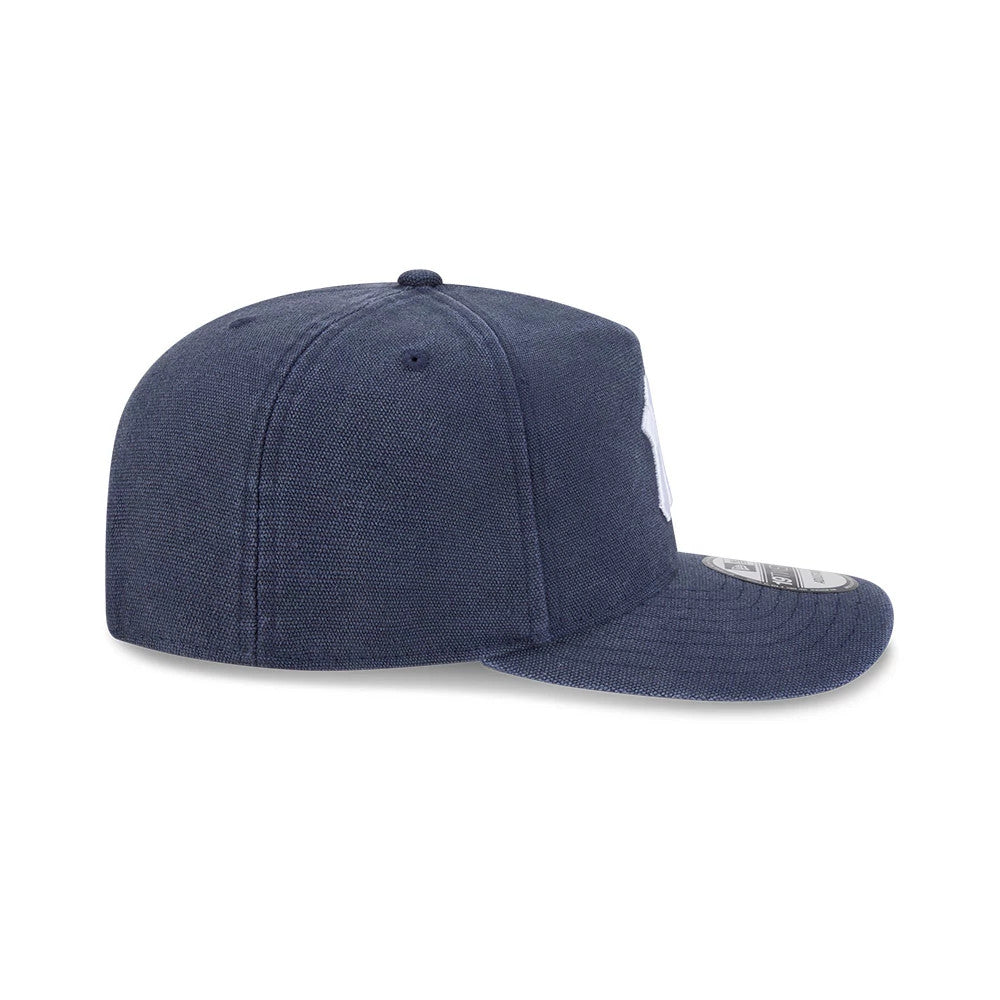 New York Yankees MLB Duck Canvas Navy New Era 19TWENTY Adjustable Cap, side view showing the white embroidered Yankees logo on the front panel, with a structured navy crown and a curved navy visor featuring a 19TWENTY size sticker.