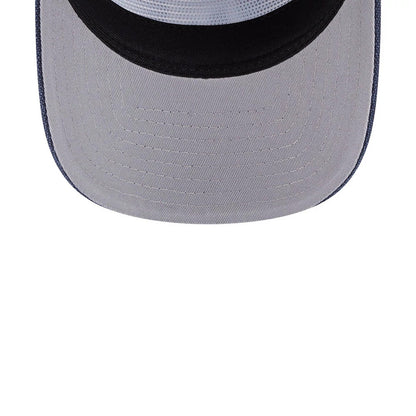 New York Yankees MLB Duck Canvas Navy New Era 19TWENTY Adjustable Cap, underside view showing the light grey undervisor, navy taping lined along the inside seams, and a deep navy band around the crown's interior edge.