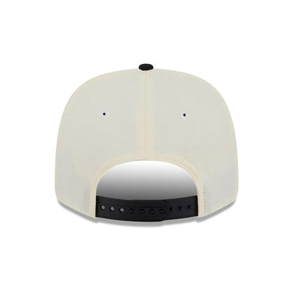 Pictured is this NBA 2 Tone Chicago Bulls 9SEVENTY Stretch Snap cap in cream & black. 7